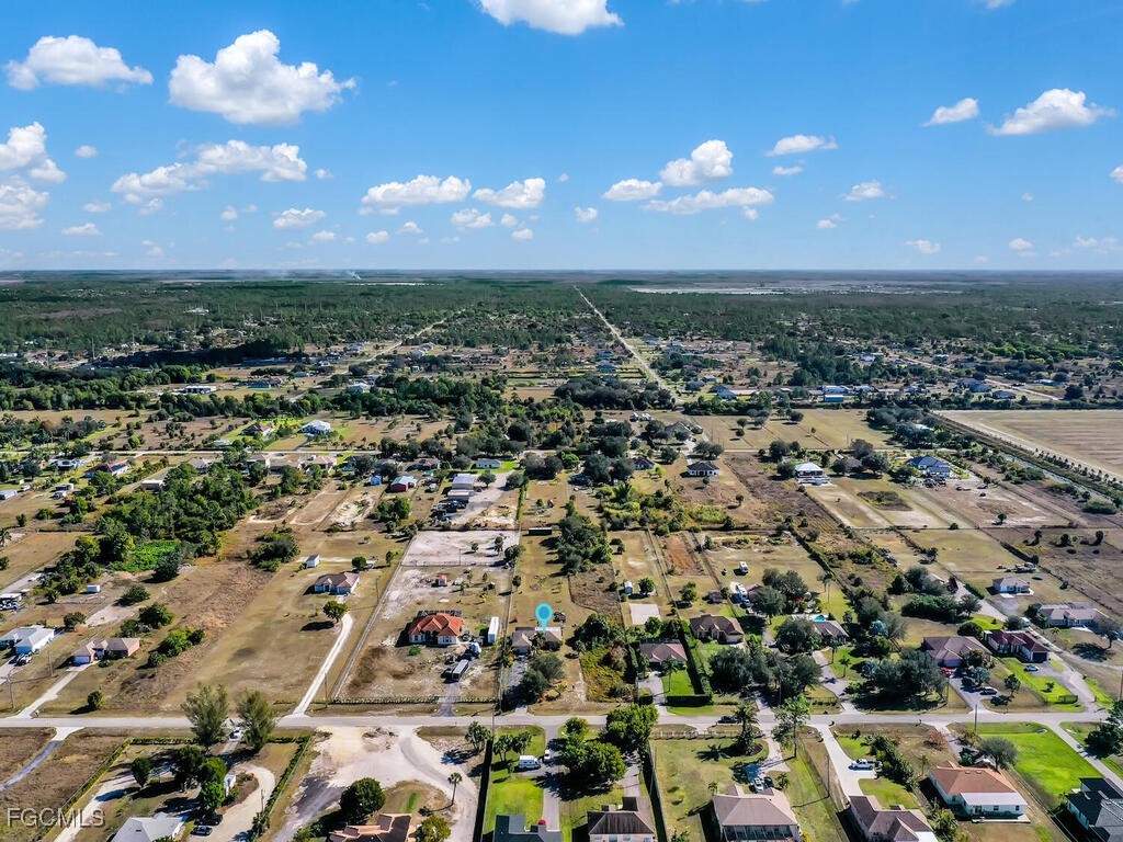 4370 20th Street Northeast Naples, FL 34120 - Photo 2 of 35 an aerial view of a city