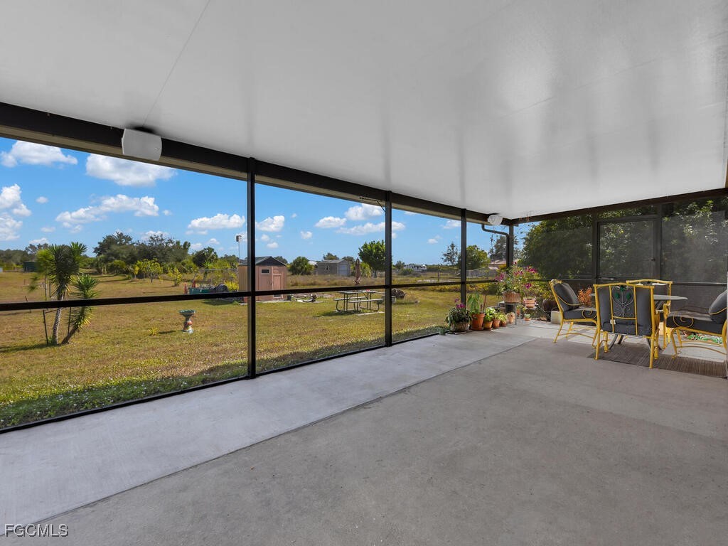 4370 20th Street Northeast Naples, FL 34120 - Photo 28 of 35 a view of an ocean with a floor to ceiling window