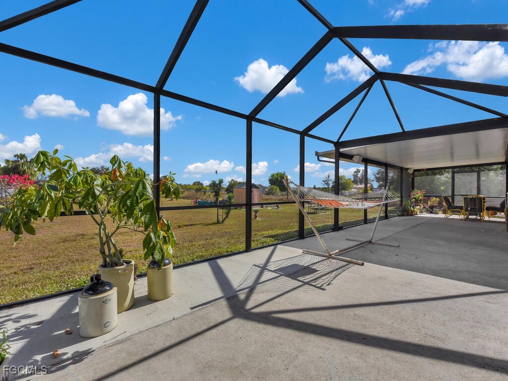 4370 20th Street Northeast Naples, FL 34120 - Photo 29 of 35 a view of a swimming pool with a patio