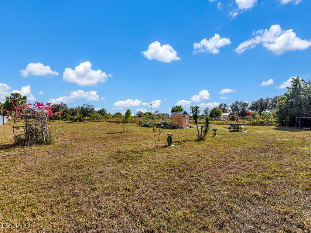 4370 20th Street Northeast Naples, FL 34120 - Photo 31 of 35 a view of a lake with sunset