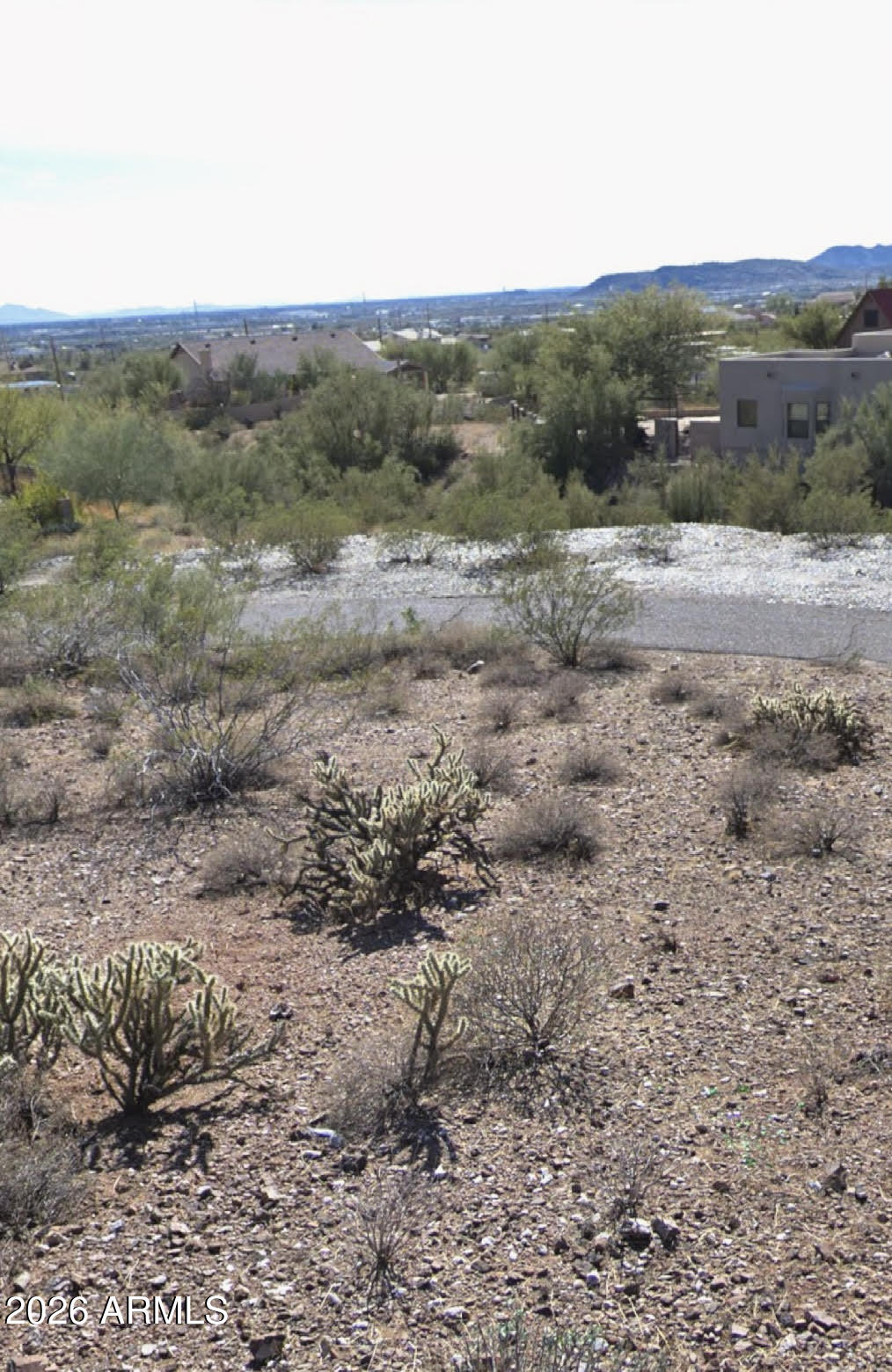 233 East Briles Road, Unit 3 Phoenix, AZ 85085 - Photo 4 of 10 a view of a dirt road with mountain view
