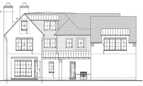 a black and white photo of a living room