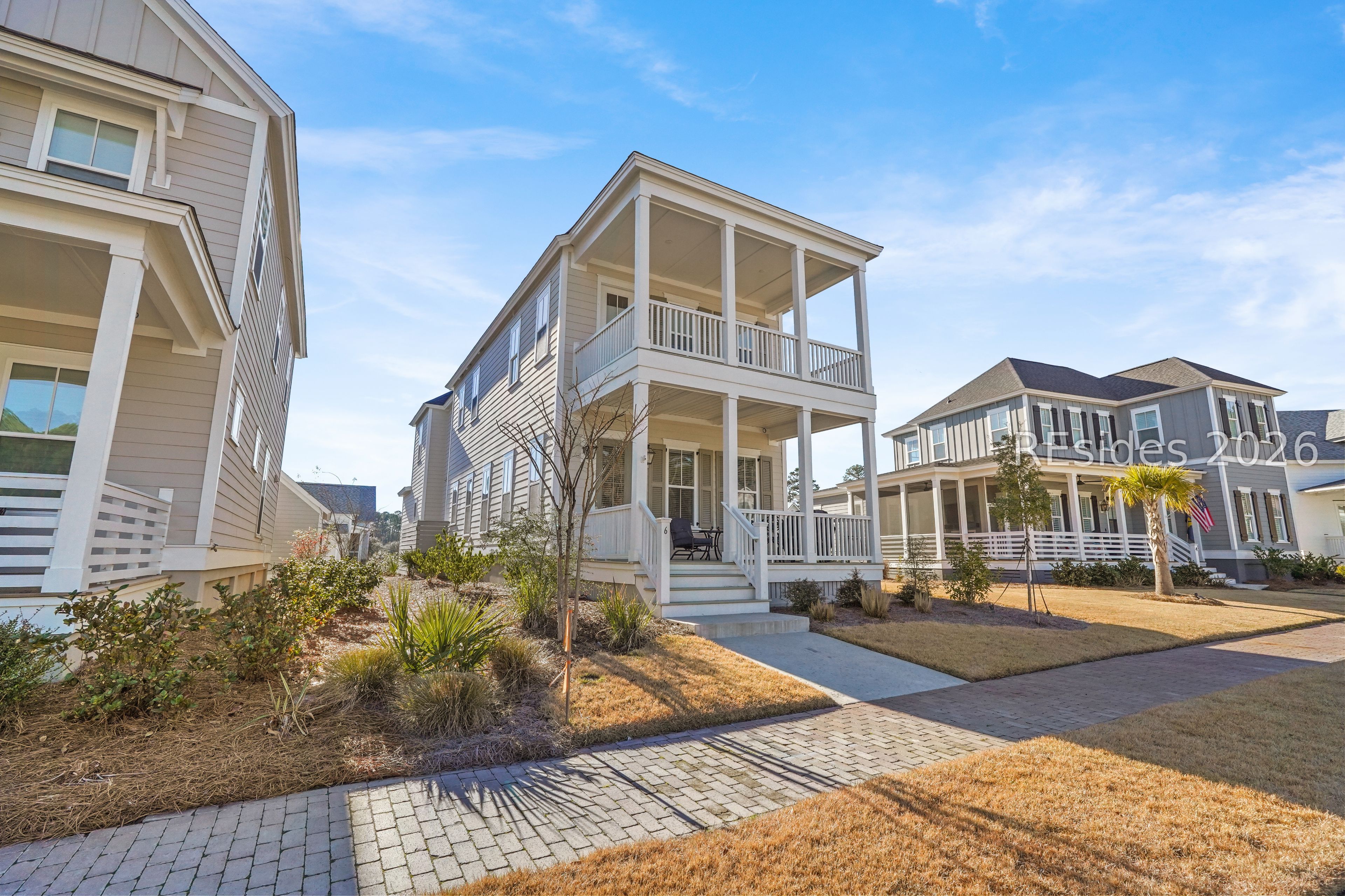 6 Buttonwood Lane Bluffton, SC 29909 - Photo 2 of 51 Twin Porches greet you from the walk