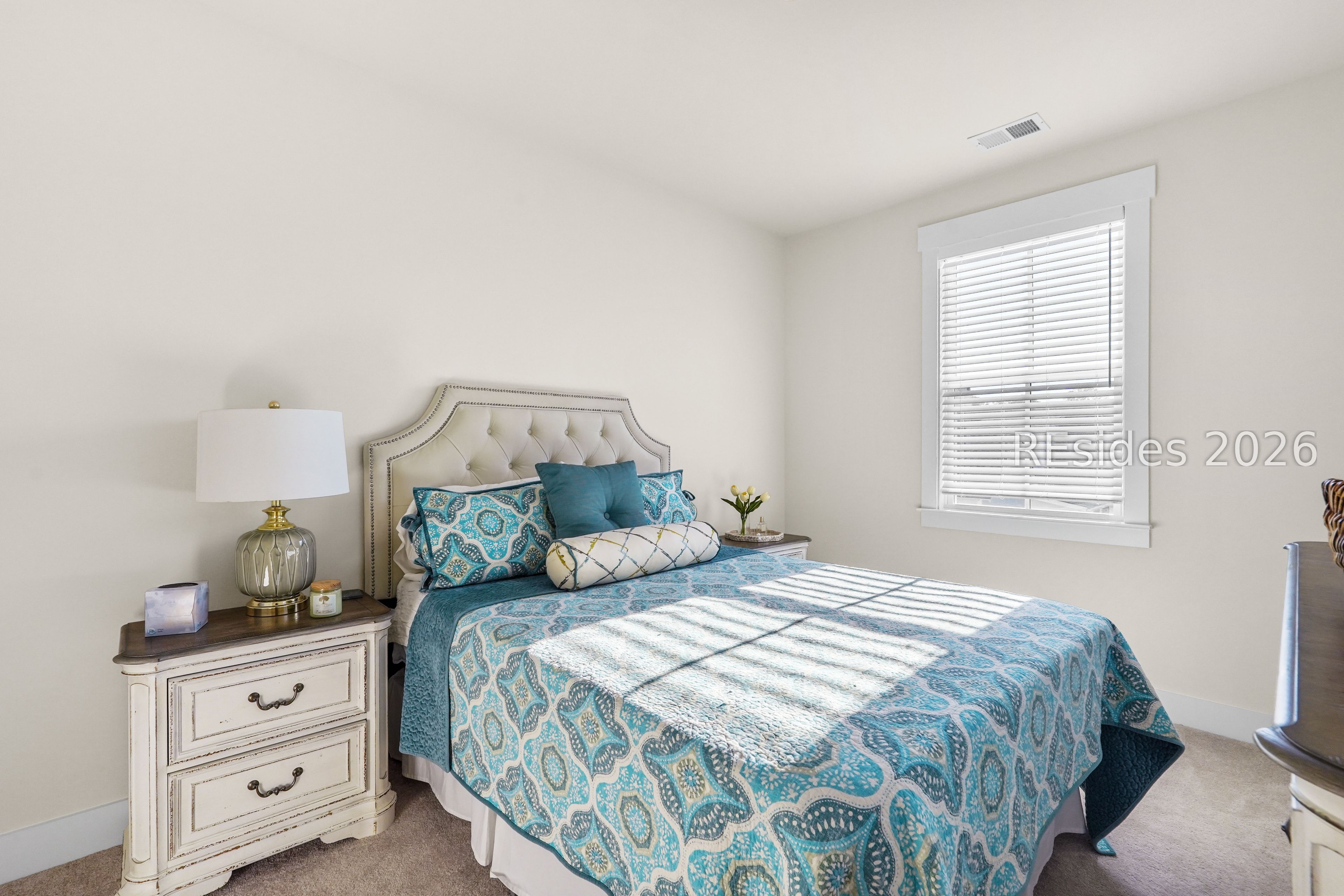 6 Buttonwood Lane Bluffton, SC 29909 - Photo 25 of 45 Bedroom #2 is bathed in light