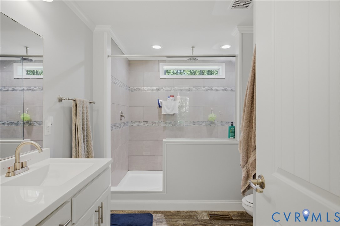 93 Faraway Road Saluda, VA 23149 - Photo 19 of 58 a bathroom with a sink and a mirror