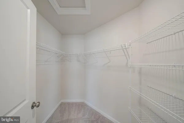 a bathroom with a sink double vanity and a mirror