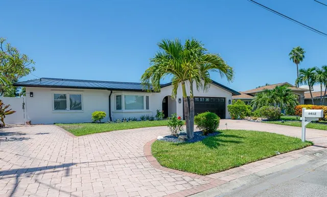 a house view with a garden space