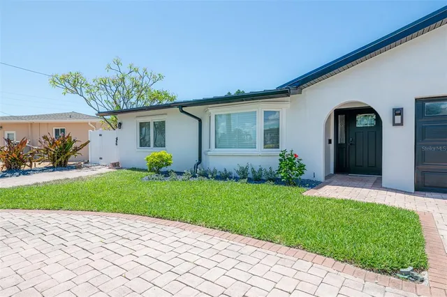 a front view of house with yard