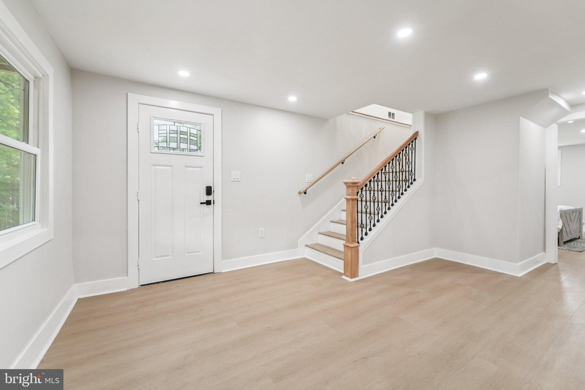 9168 Fort Smallwood Road Pasadena, MD 21122 - Photo 16 of 42 a view of an entryway with stairs