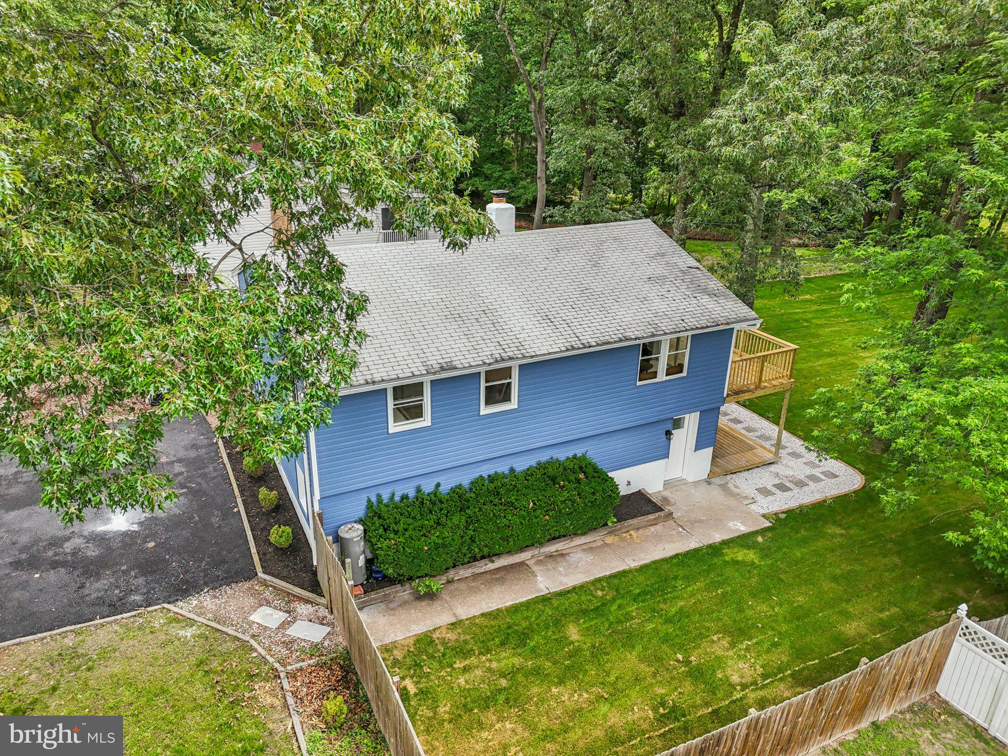 9168 Fort Smallwood Road Pasadena, MD 21122 - Photo 25 of 42 front view of a house with a yard