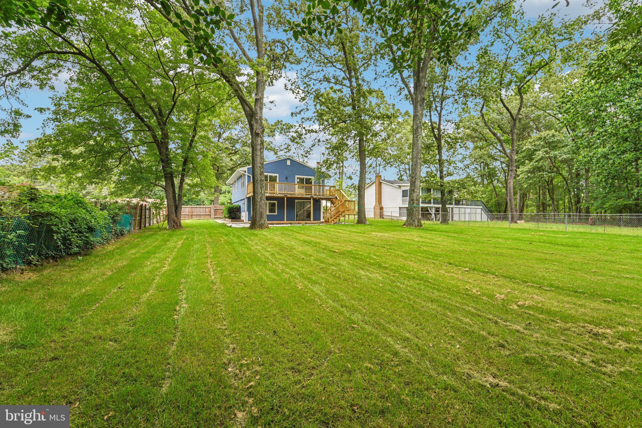 9168 Fort Smallwood Road Pasadena, MD 21122 - Photo 33 of 42 a view of a house with a big yard