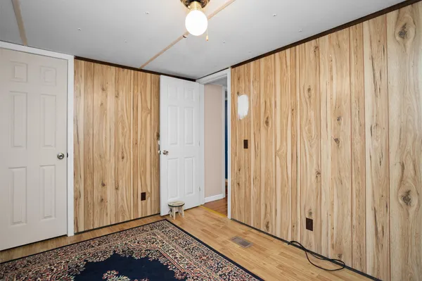a view of a livingroom with wooden floor