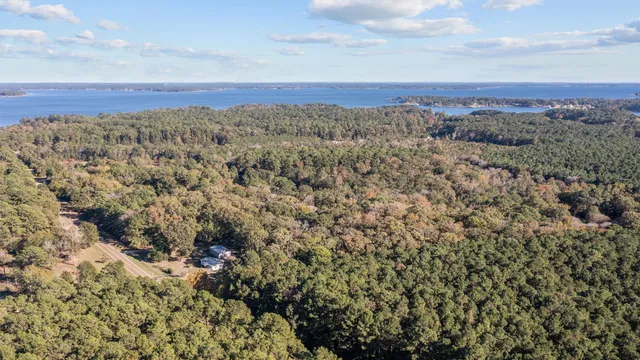 a view of living room with furniture and wooden floor