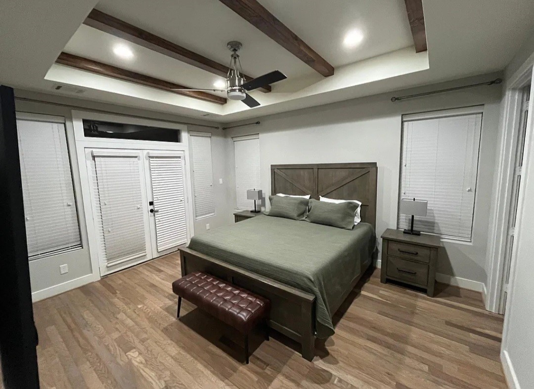 1503 Robin Street, Unit C Houston, TX 77019 - Photo 6 of 18 a bedroom with a bed and a shower