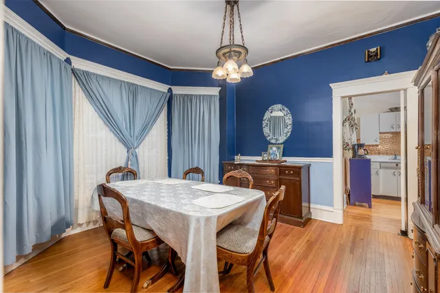a kitchen with stainless steel appliances a stove a sink and a refrigerator