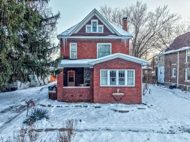 a view of house with wooden deck