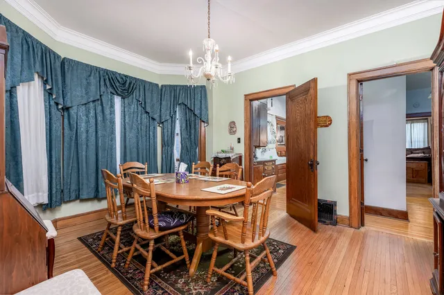 a kitchen with stainless steel appliances a refrigerator and a stove top oven