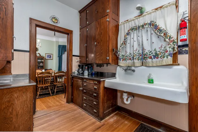 a view of dining room and wooden floor