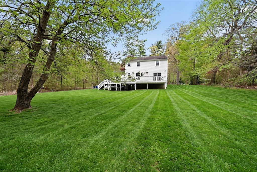 59 First Parish Road Norwell, MA 02061 - Photo 30 of 37 a view of a house with a yard
