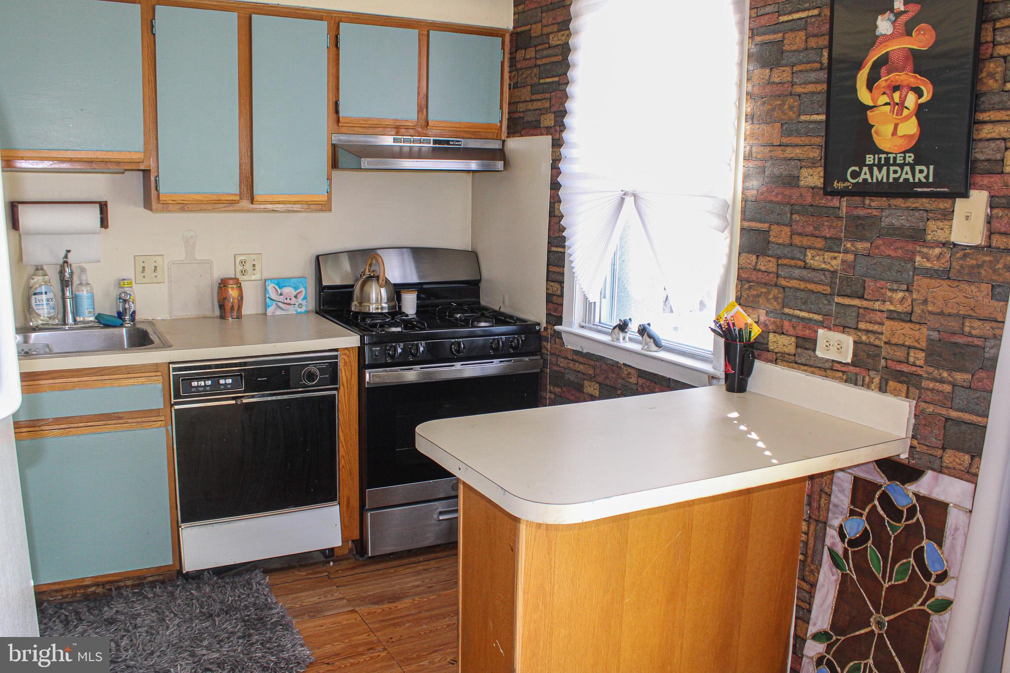 3224 Comly Road Philadelphia, PA 19154 - Photo 11 of 32 a kitchen with stainless steel appliances granite countertop a sink and a stove