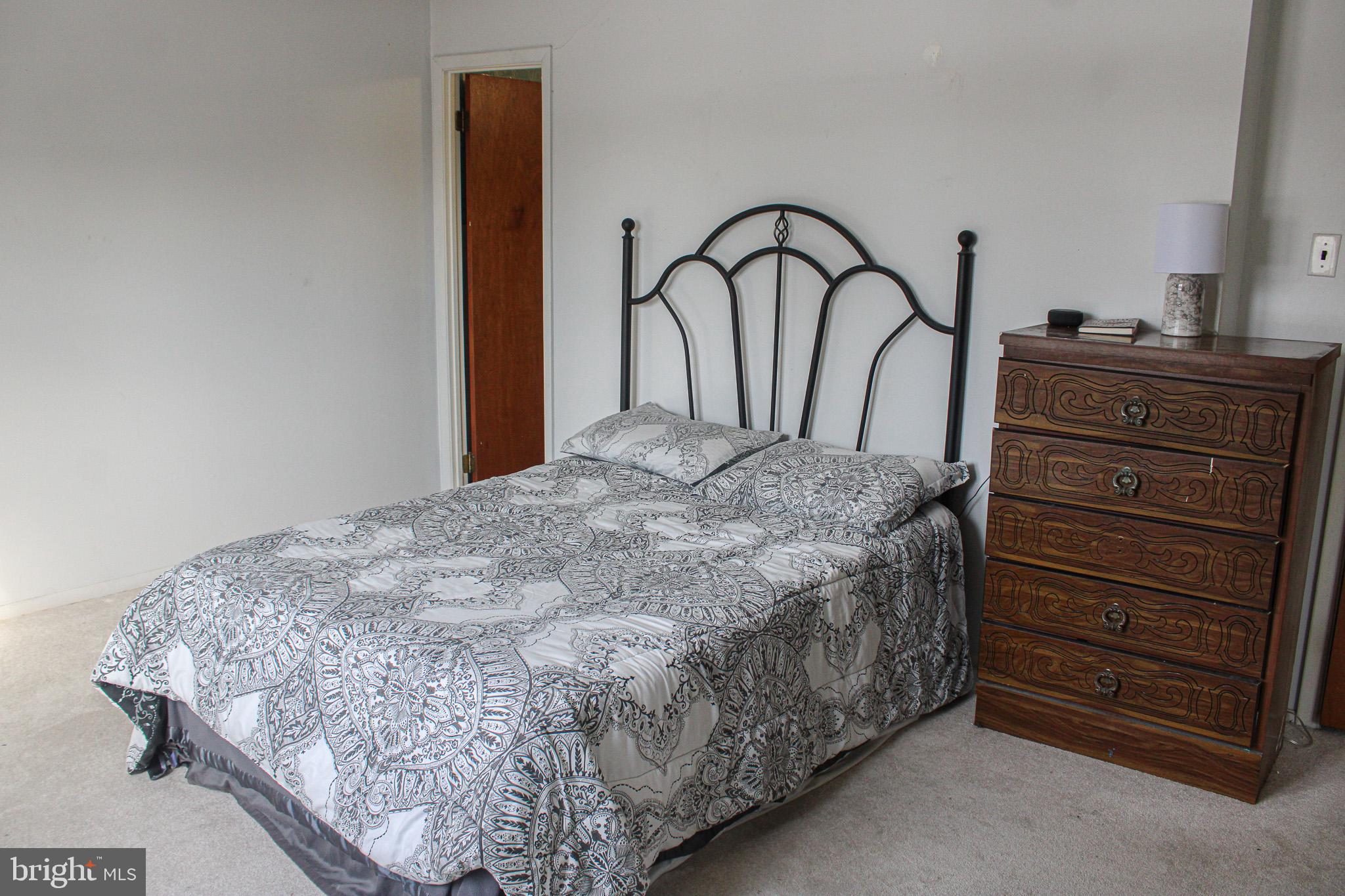 3224 Comly Road Philadelphia, PA 19154 - Photo 15 of 32 a bedroom with a bed and a dresser