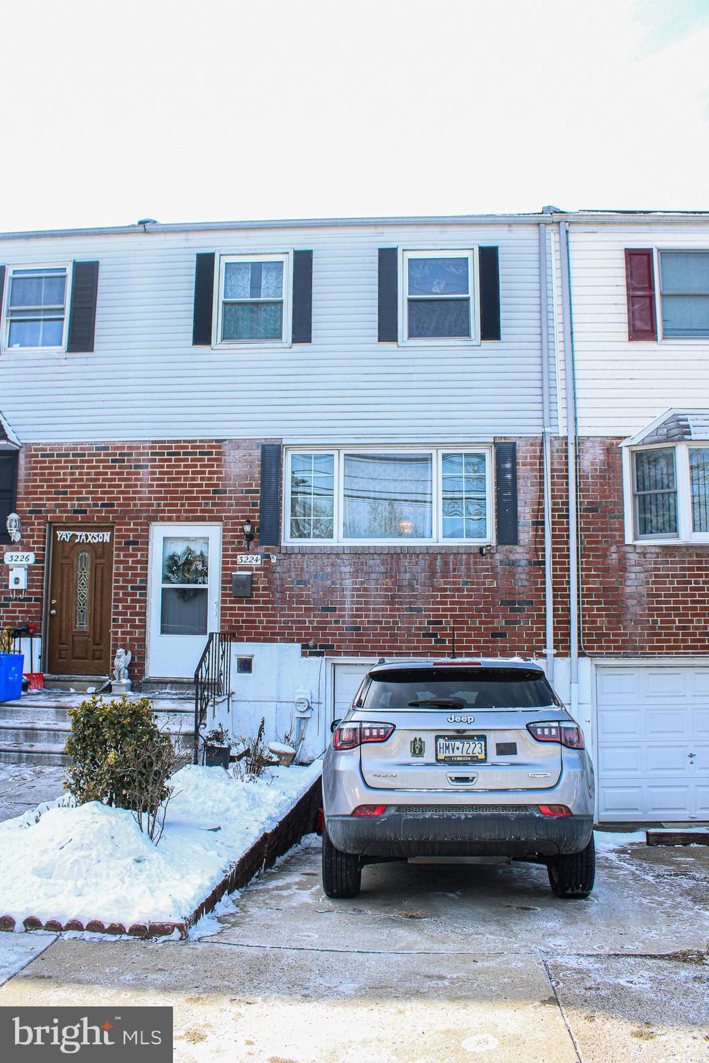3224 Comly Road Philadelphia, PA 19154 - Photo 2 of 32 a front view of a house with a yard