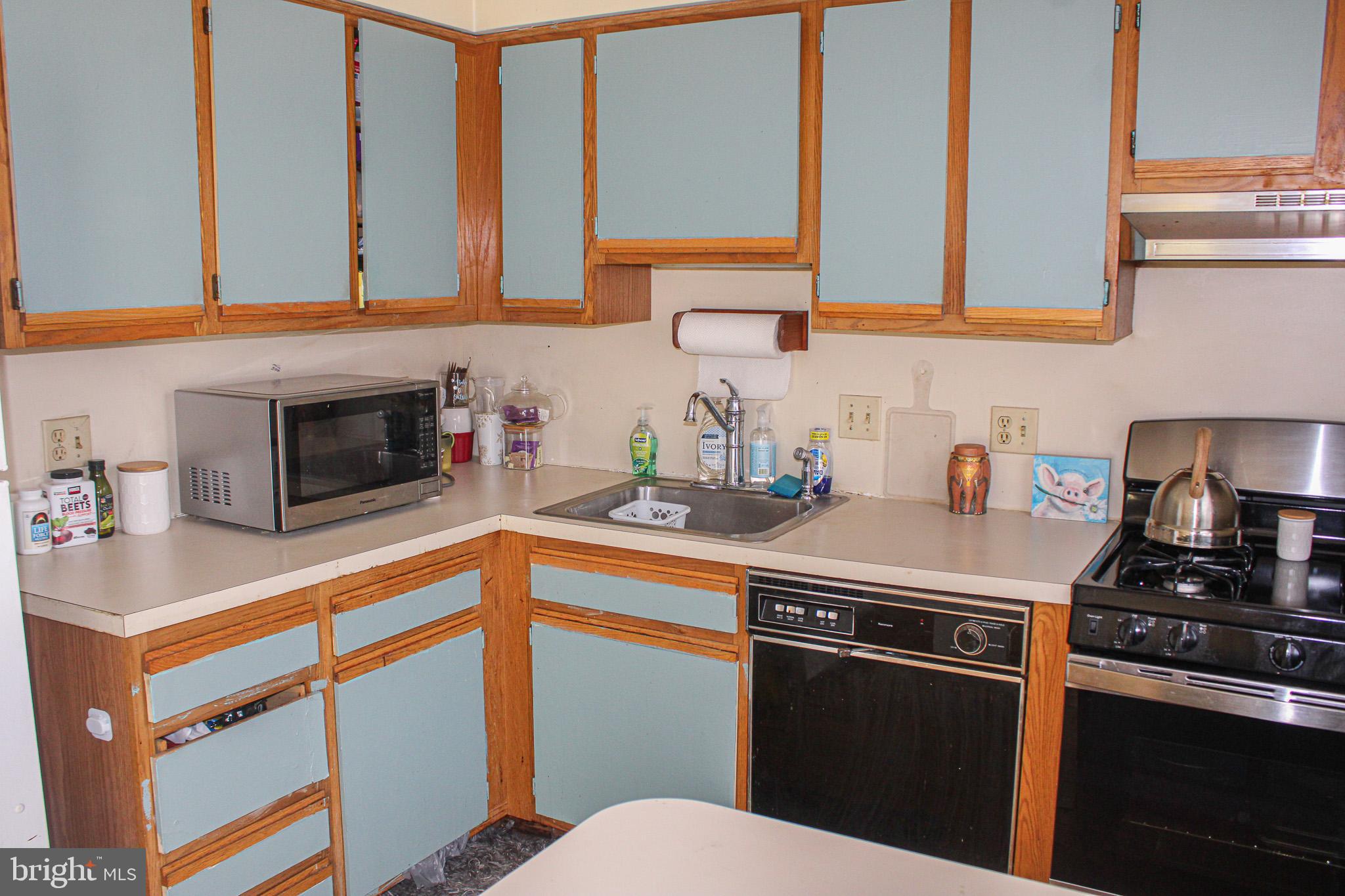 3224 Comly Road Philadelphia, PA 19154 - Photo 10 of 32 a kitchen with stainless steel appliances a sink and a stove