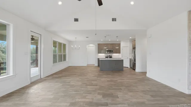 a kitchen with a stove and a microwave