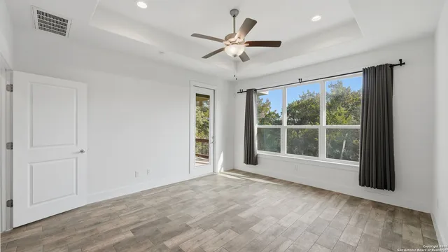 en view of an empty room with a window