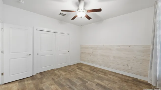 a view of a room with a large window