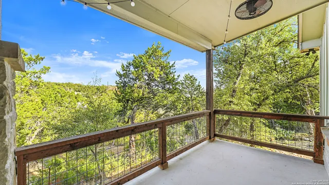 a view of porch with a door and a porch