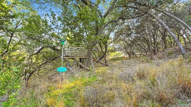 an aerial view of a house with a garden