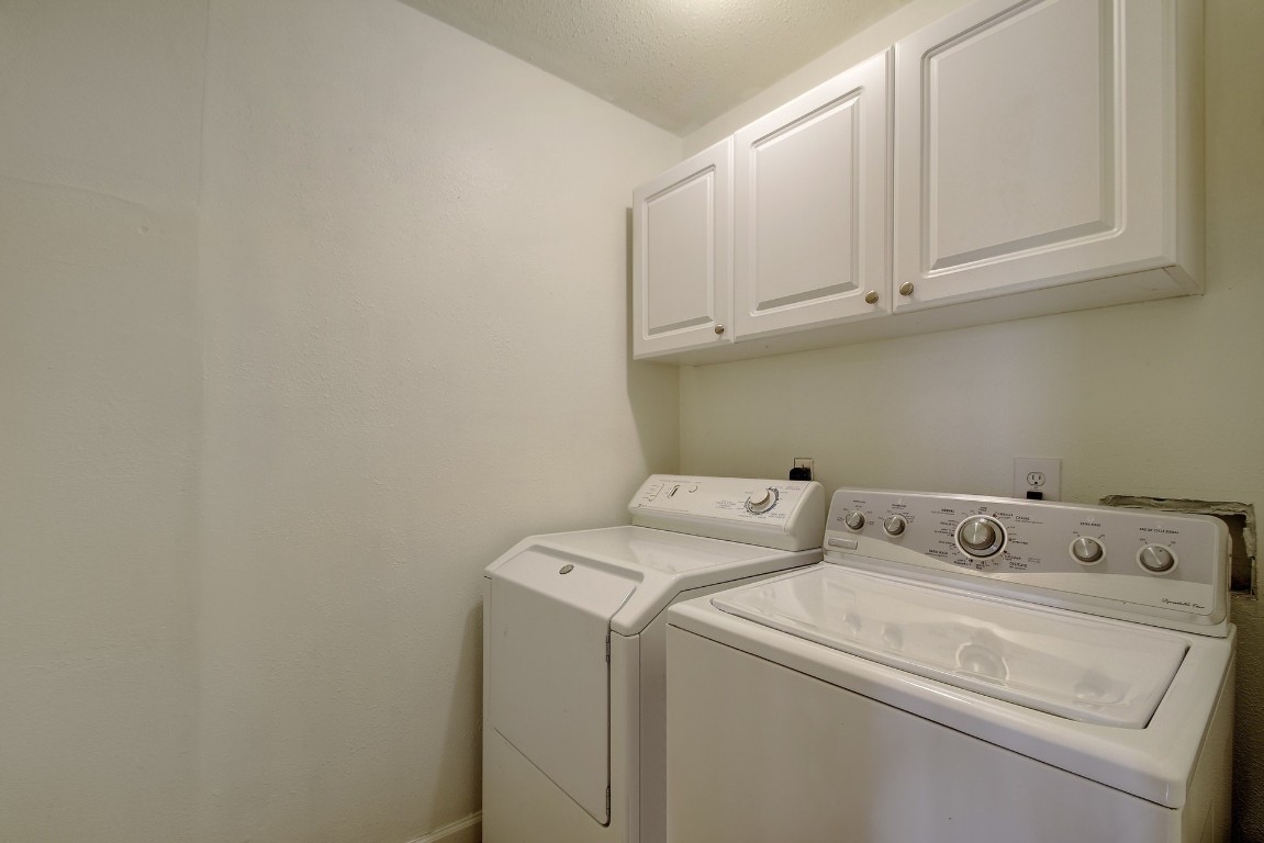 1704 East M. Franklin Avenue, Unit C Austin, TX 78721 - Photo 14 of 18 a utility room with dryer and washer