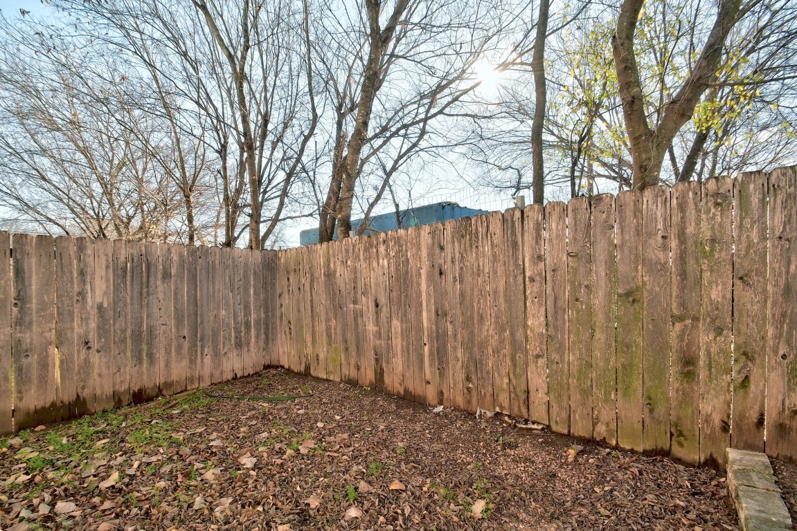 1704 East M. Franklin Avenue, Unit C Austin, TX 78721 - Photo 15 of 18 a view of a backyard of the house