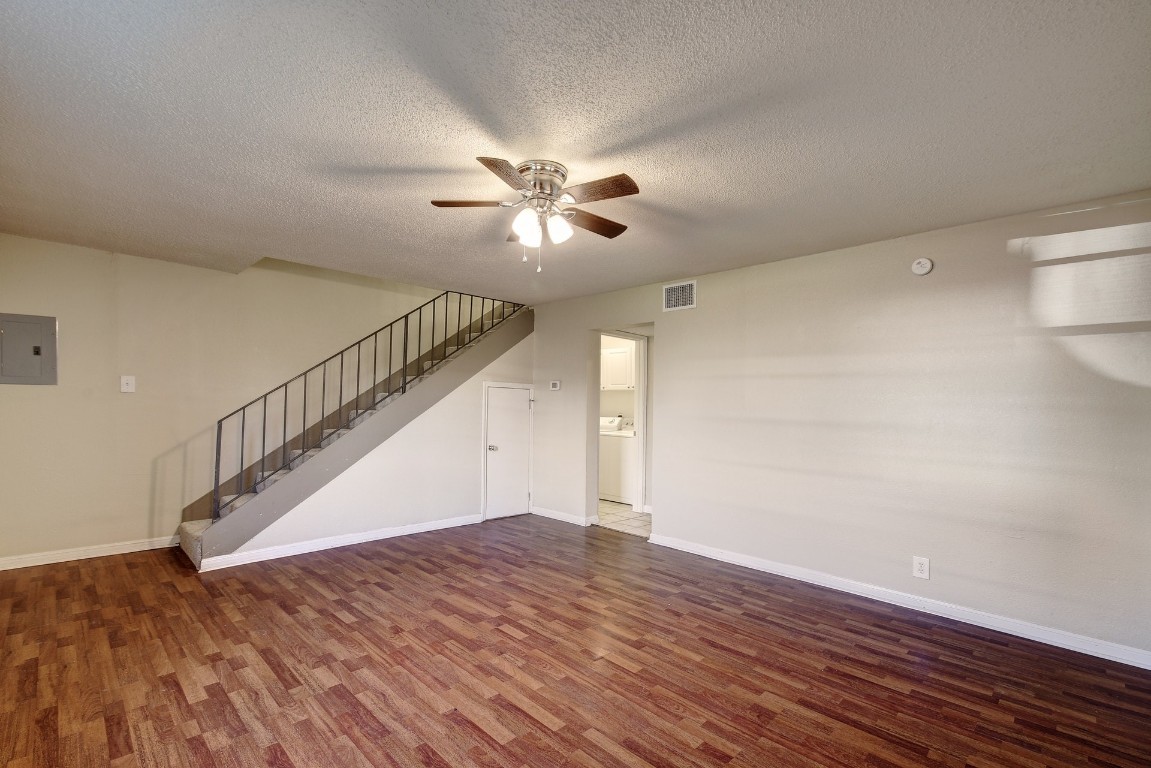 1704 East M. Franklin Avenue, Unit C Austin, TX 78721 - Photo 4 of 18 a view of entryway and hall with wooden floor