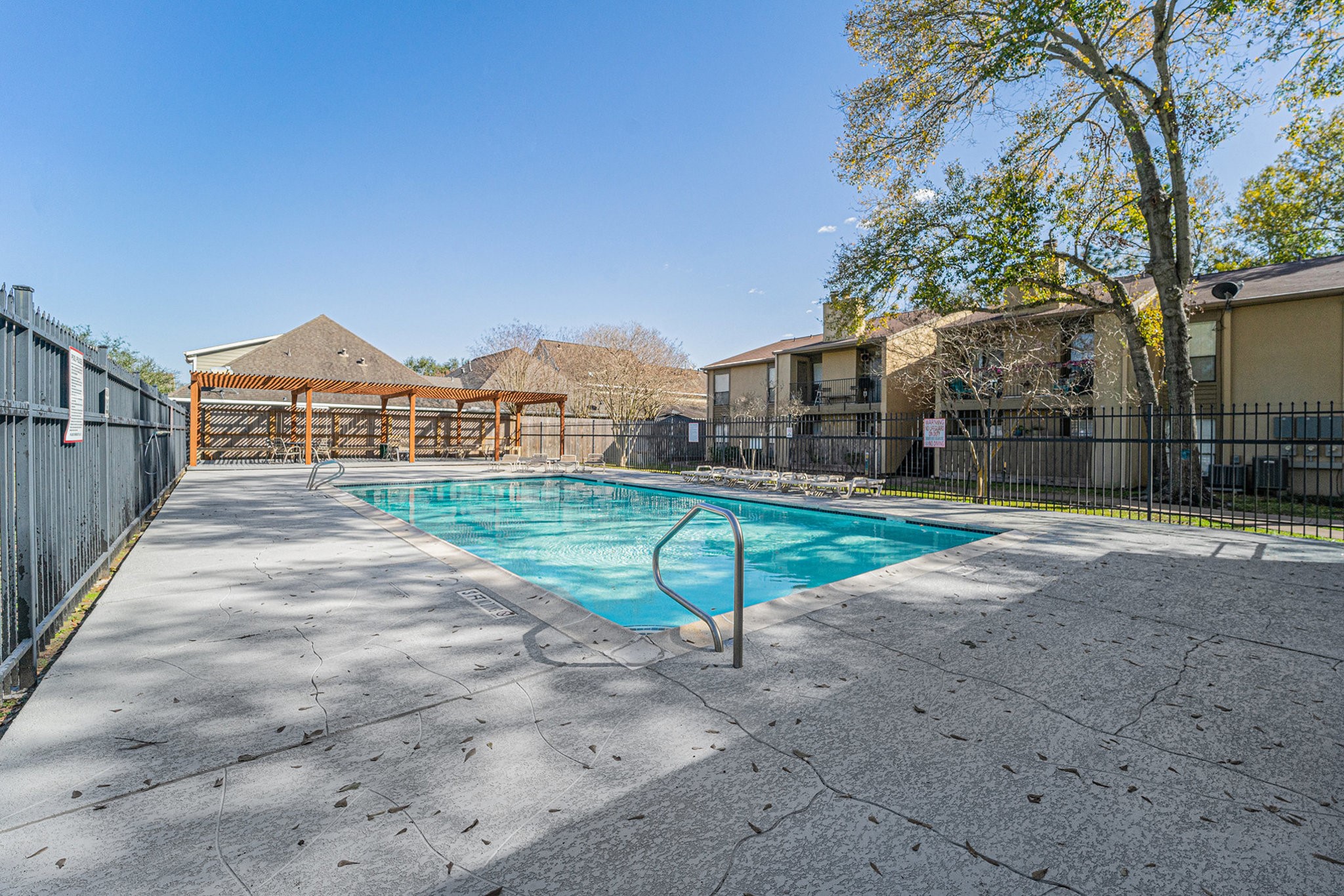 3300 Pebblebrook Drive, Unit 75 Seabrook, TX 77586 - Photo 13 of 30 a view of a house with a yard and large trees