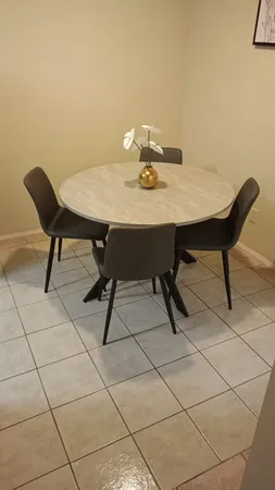 a view of a workspace with furniture