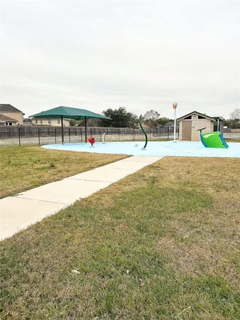 a view of a swimming pool and an ocean view