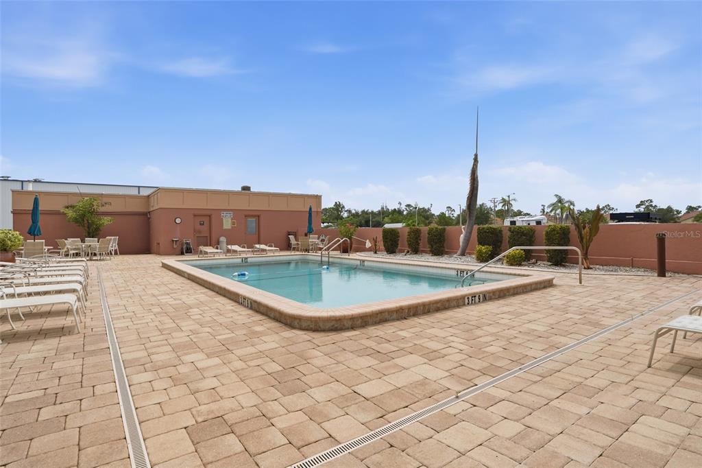 3170 Matecumbe Key Road, Unit 127 Punta Gorda, FL 33955 - Photo 21 of 22 a view of a terrace with chairs