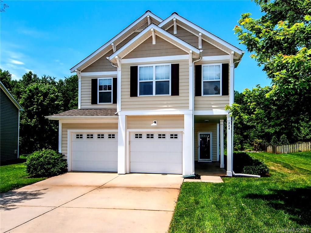 284 Sand Paver Way Fort Mill, SC 29708 - Photo 1 of 24 a front view of a house with a yard
