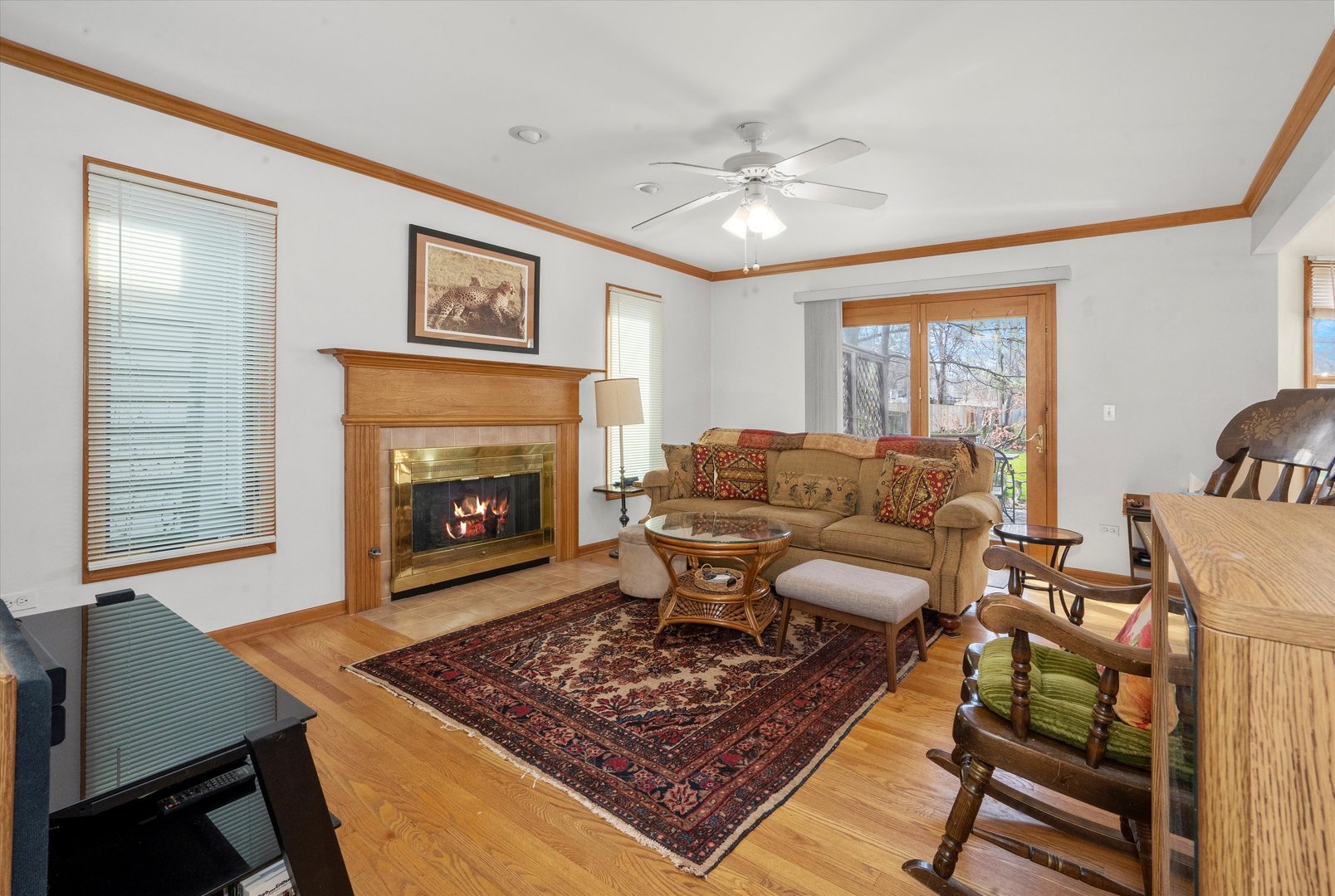 2260 Manchester Road Wheaton, IL 60187 - Photo 13 of 35 a living room with furniture and a fireplace