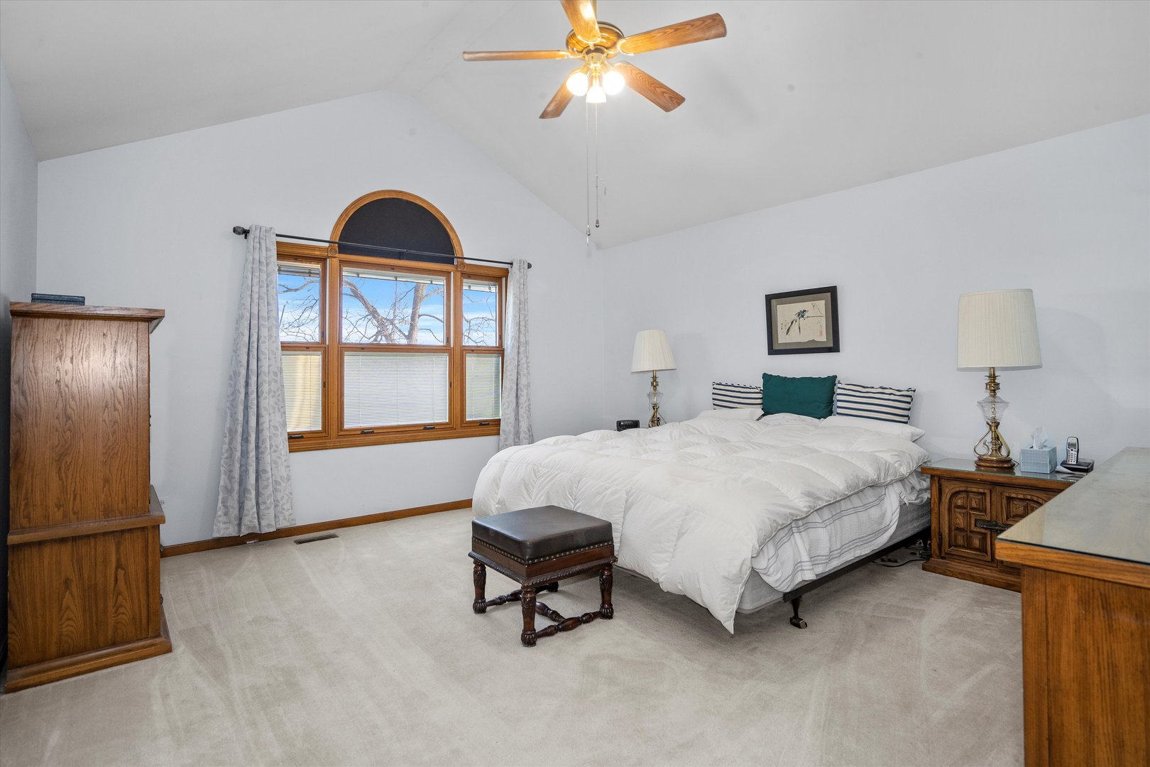 2260 Manchester Road Wheaton, IL 60187 - Photo 15 of 35 a bedroom with a bed and a chandelier