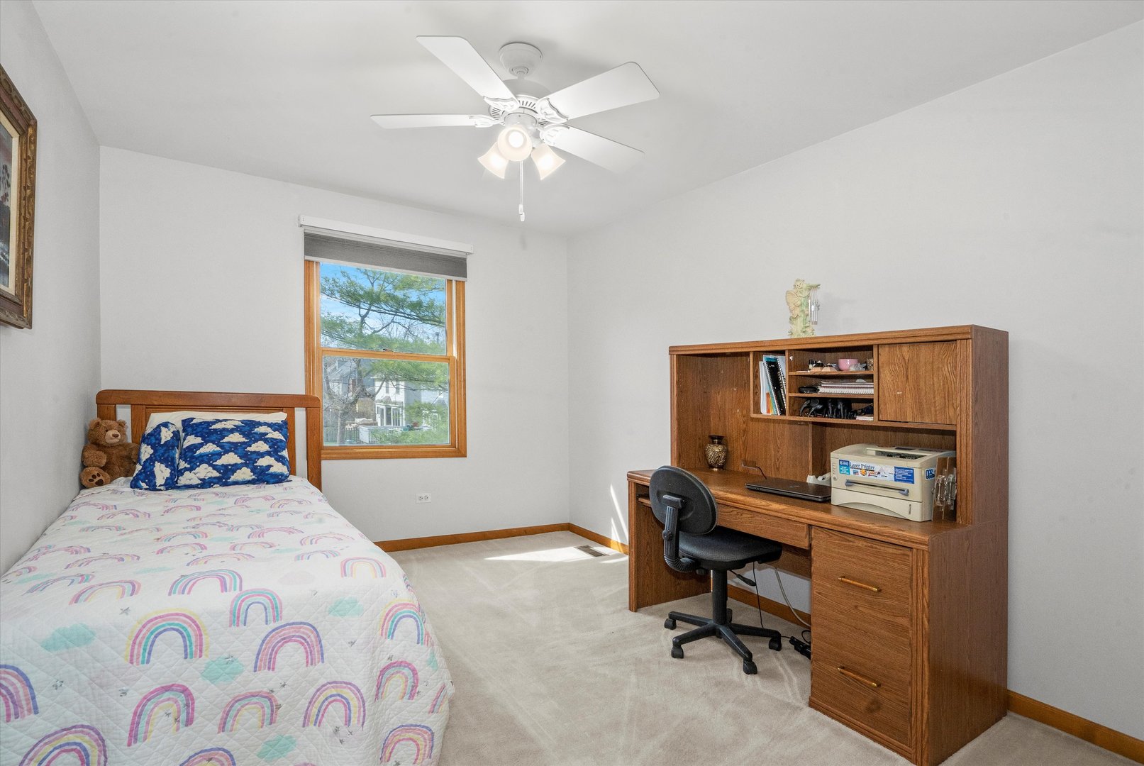 2260 Manchester Road Wheaton, IL 60187 - Photo 21 of 35 a bedroom with a bed and a chandelier