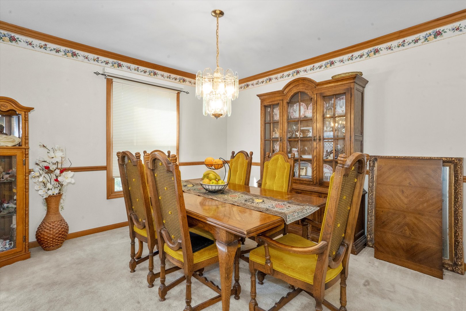 2260 Manchester Road Wheaton, IL 60187 - Photo 6 of 35 a view of a dining room with furniture and chandelier