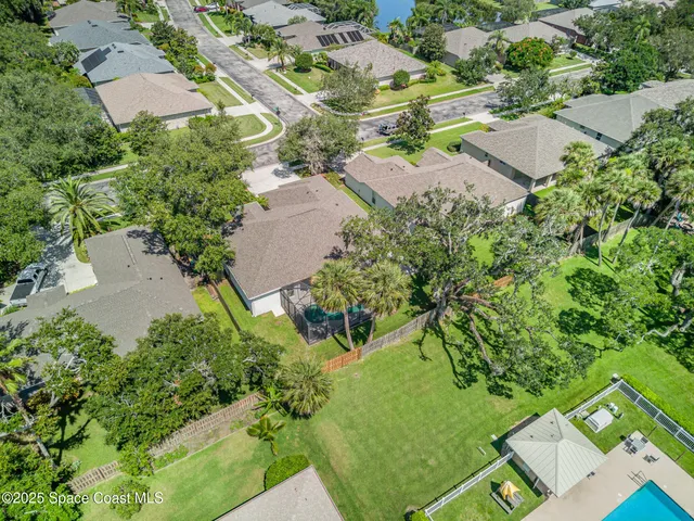 an aerial view of residential house with outdoor space