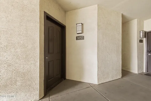 a view of a hallway with closet area