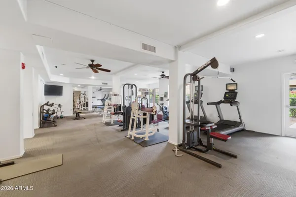 a view of a room with gym equipment