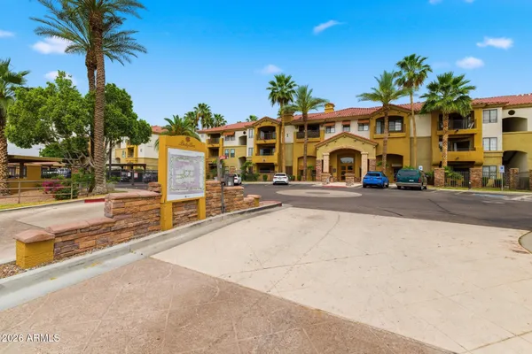 a front view of building with street