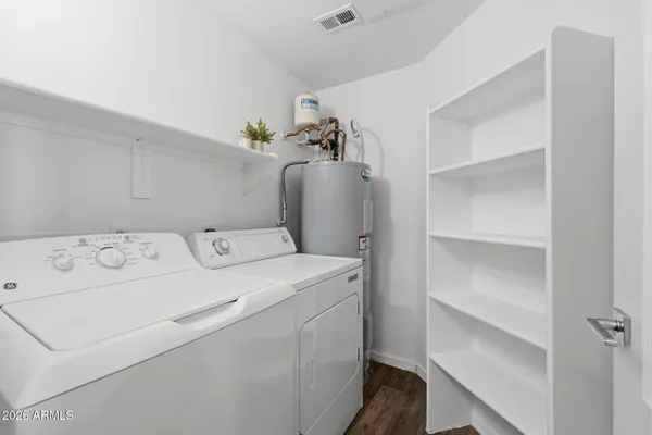 a utility room with dryer and washer