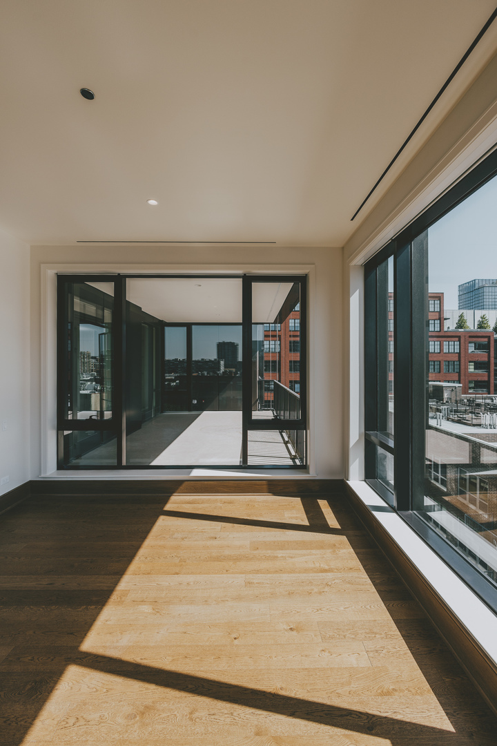 21 North May Street, Unit 601 Chicago, IL 60607 - Photo 19 of 64 a view of a living room with a large window